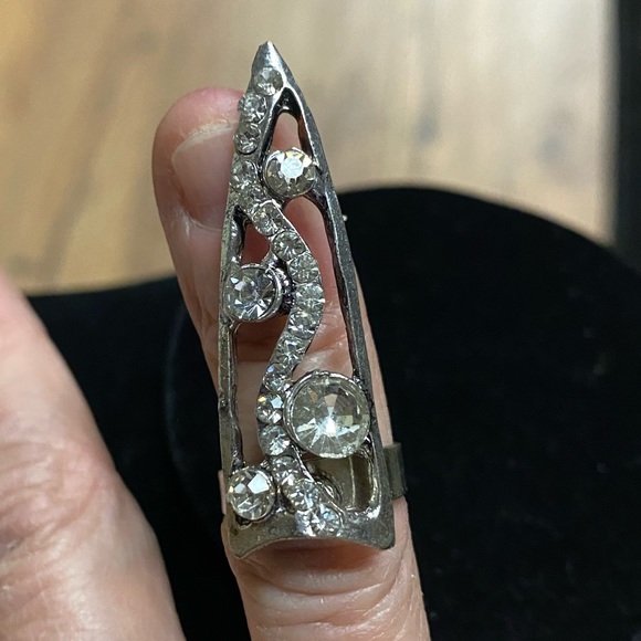 Jewelry - Unusual Silver tone Ring with Clear Stones